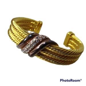 Wide gold tone mixed metal accent cuff bracelet